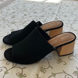 Lovely Swede slip on Tom’s size 7.5. 21/4 inch wooden heel with nonslip soles.